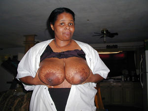 Thick black woman with huge round tits,